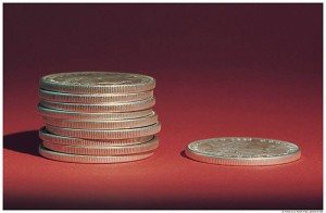 stack of nine coins and one coin