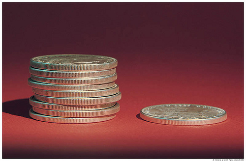 stack of nine coins and one coin