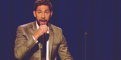 John Krasinski drops the mic, then catches it, because dropping is bad for the mic.